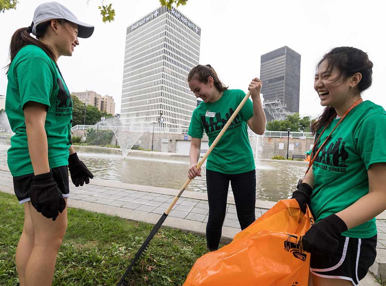 University of Rochester students doing volunteer landscaping work for Wilson Day